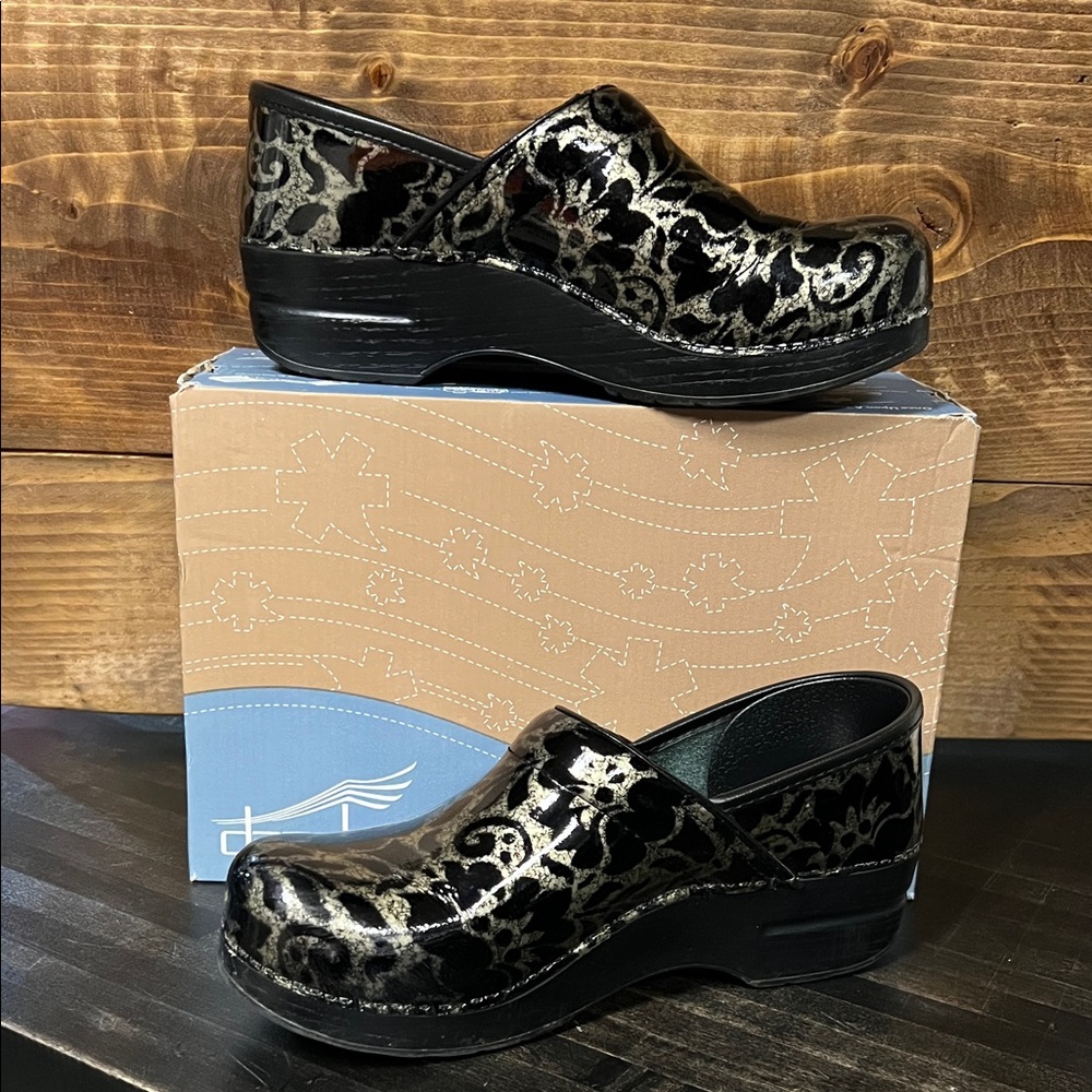 Dansko Black and Silver Patterned Clogs